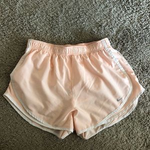 peach running shorts